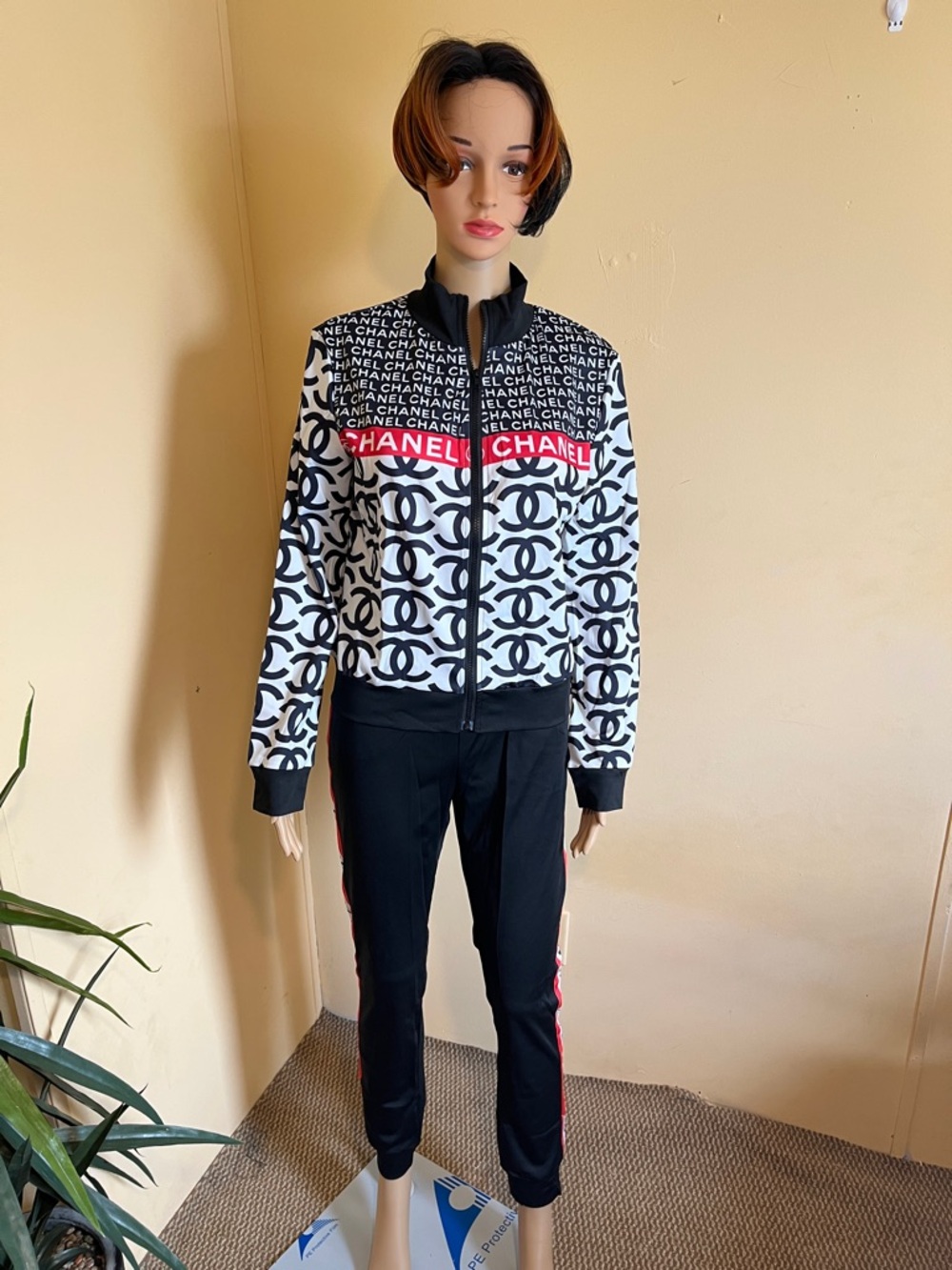 CHANEL Black & White Logo Bomber Jacket with Red Stripe